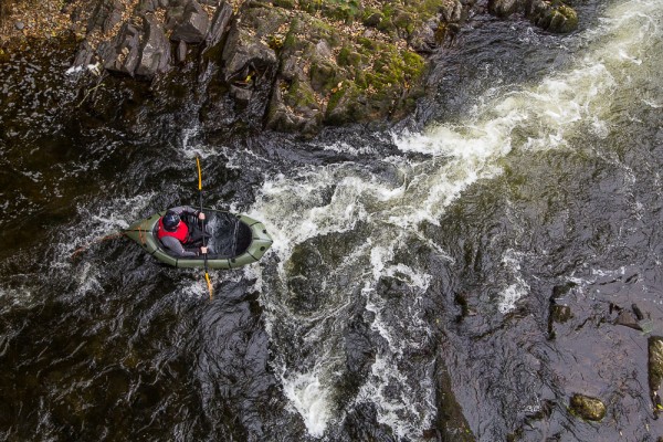 Multiday amphibian David Hine, on an easier grade ii stretch of the Tweed.
