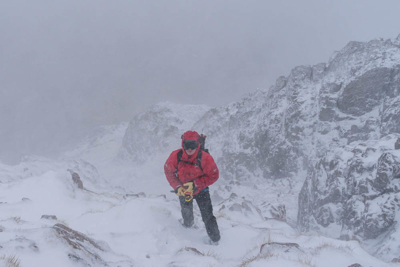 Mick in a passing snow shower, high on the Sron