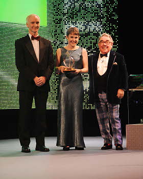 Helen Webster receiving the award from Ronnie Corbett and Eddie Brogan of Scottish Enterprise